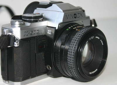 Objectif 50mm et Minolta X500 w:400, h:293 Objectif 50mm et Minolta X500